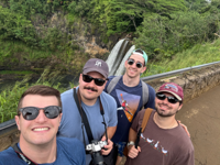 Wailua Falls scenic vantage featuring Alex, Ryan, and Chris.